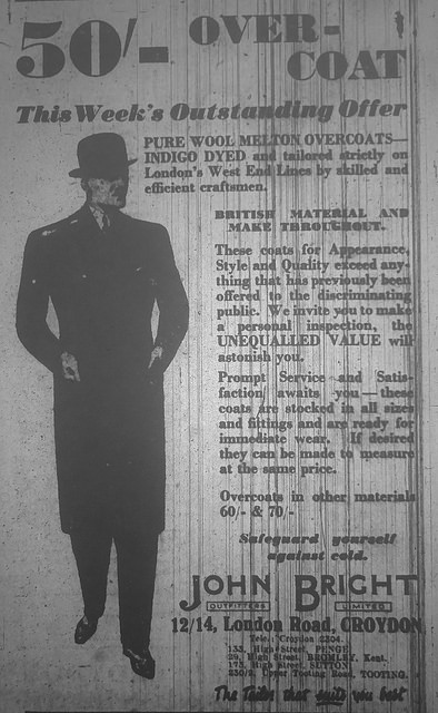 An advertisement headed “50'- over-coat / This Week’s Outstanding Offer”.  A drawing of a man in a bowler hat and long, narrow coat is on the left-hand side.  At the bottom is the address “12/14, London Road, Croydon”.