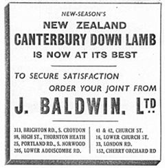 A black-and-white text-only newspaper advertisement reading: “New-season’s New Zealand Canterbury Down lamb is now at its best. To secure satisfaction order your joint from J Baldwin Ltd. 313, Brighton Road, S Croydon. 98, High Street, Thornton Heath. 25, Portland Rd, S Norwood. 205, Lower Addiscombe Rd. 41 & 42, Church Street. 16, Lower Church St. 33, London Rd. 152, Cherry Orchard Rd.”