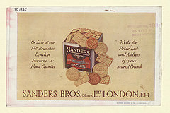 A page from a colour catalogue showing a drawing of a square biscuit tin with circular and rectangular biscuits spilling out of it.  Wording on the biscuits reads “NICE”, “MARIE”, and “THIN LUNCH”.  The biscuit tin reads “Sanders London Assorted Biscuits”.  Writing on either side of the drawing reads “On Sale at our 174 Branches London Suburbs & Home Counties / Write for Price List and Address of your nearest Branch”.  Writing under the drawing reads “Sanders Bros. (Stores) Ltd., London, E.14”.