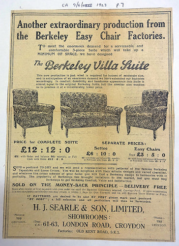 Advert headed “Another extraordinary production from the Berkeley Easy Chair Factories.”  Drawings of a sofa and two armchairs are shown in the middle of text describing “a serviceable and comfortable 3-piece Suite which will take up a MINIMUM OF SPACE [...] for houses of moderate size”.  At the bottom is the address: “H. J. Searle & Son, Limited, Showrooms: 61–63, London Road, Croydon” and the note: “Factories: Old Kent Road, S.E.1”.