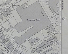 A black-and-white map showing a large “Department Store” and a smaller building labelled “Clark’s College” below it.