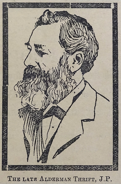 A monochrome line drawing of a white man with a full beard and moustache and a slightly receding hairline.  He is wearing a suit and looking off to the left.