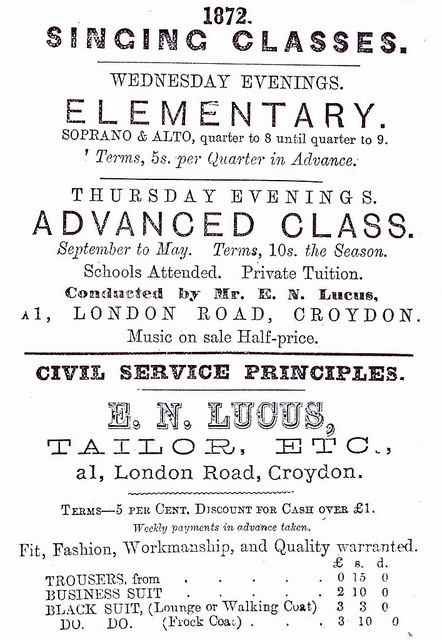 A black-and-white text-only advert in a variety of fonts, headed “1872” and advertising elemetary singing lessons on Wednesday evenings, an advanced class on Thursday evenings, and trousers and suits made on “Civil Service principles”.