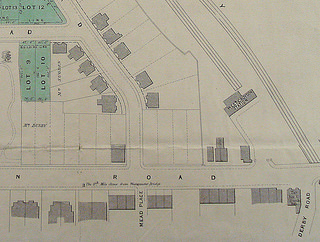 Another street plan showing the same area, with different plots marked in green.  Mr Stapleton’s plot now has a grey rectangle on it, indicating a building.