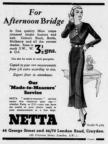 Newspaper advertisement showing a drawing of an unusually tall and thin white woman posing in a long-sleeved dress. The heading reads “For Afternoon Bridge”, and “Netta” is printed in large capital letters further down.