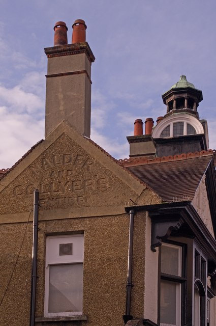 The gable end of a building, with “Nalder and Collyer’s
Entire” debossed into it in large letters.