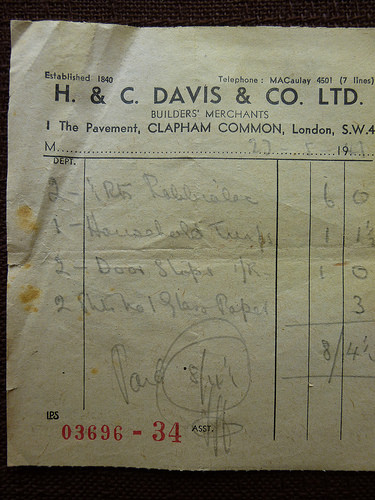 A crumpled paper receipt with a few rust stains.  The printed header reads “H. & C. Davis & Co. Ltd.” with an address of 1 The Pavement, Clapham Common, SW4.  Four items are written beneath in pencil (see following caption for description).
